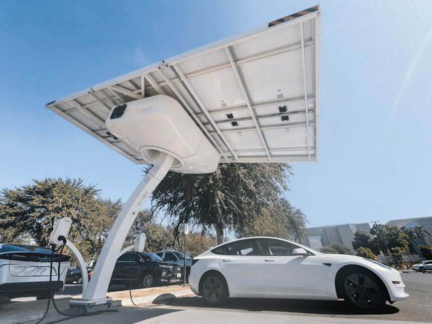 Electric car charging under a modern solar panel station, showcasing clean energy technology.
