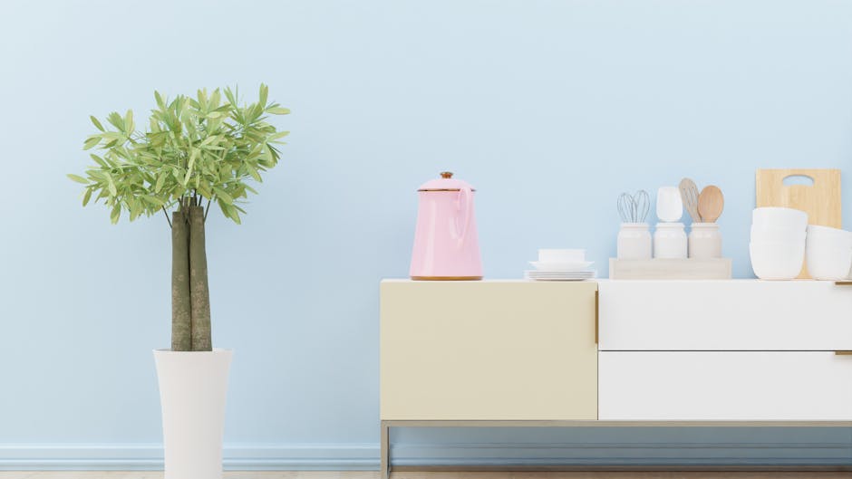 A modern kitchen interior featuring a pastel color scheme with decorative kitchenware and plant.