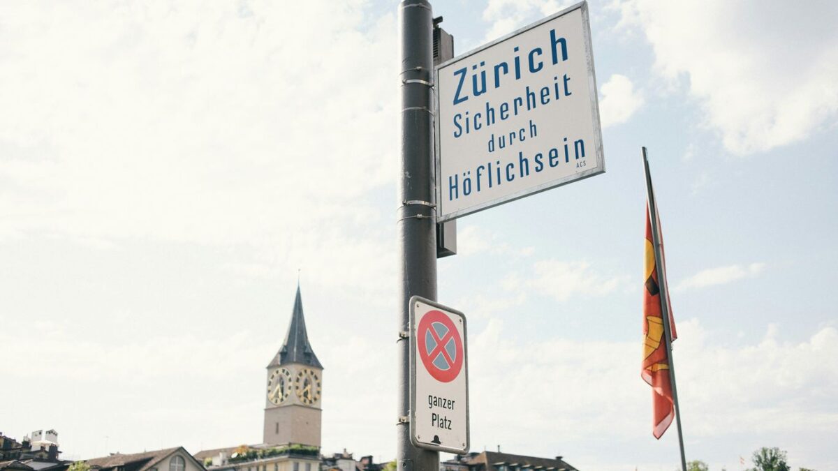 blue and white street sign